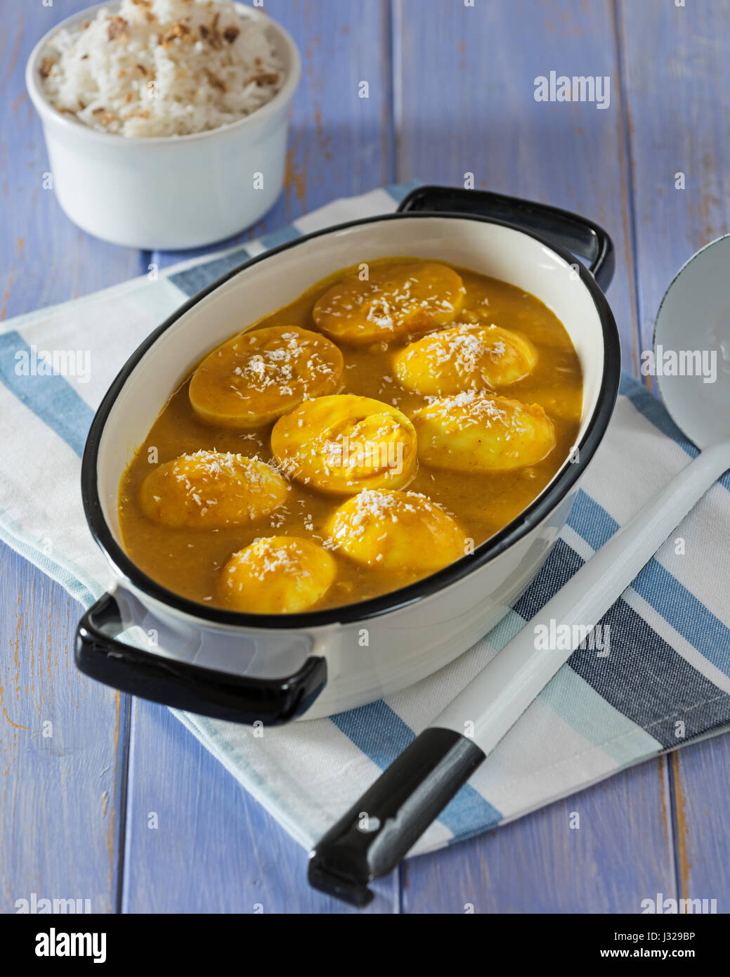 Curried eggs and rice Stock Photo