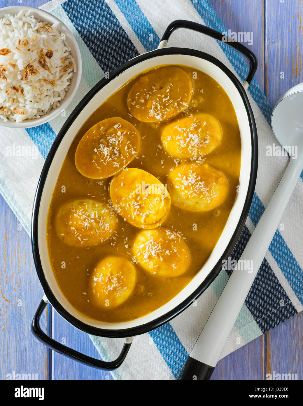 Curried eggs and rice Stock Photo