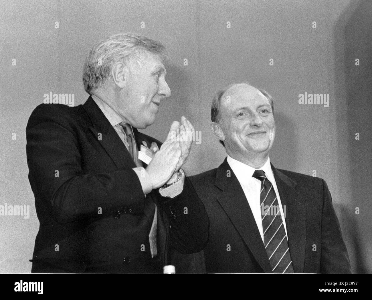 Roy Hattersley (left), Deputy Leader of the Labour party and Neil Kinnock, Leader, stand at the end of the Leaders speech to the party conference in Brighton, England on October 5, 1989. Stock Photo