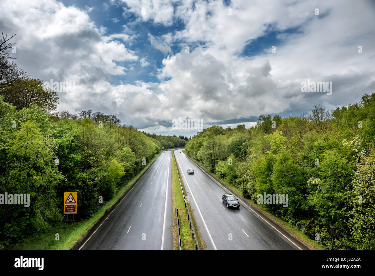 The A264 road between Horsham and Crawley as it cuts through Buchan