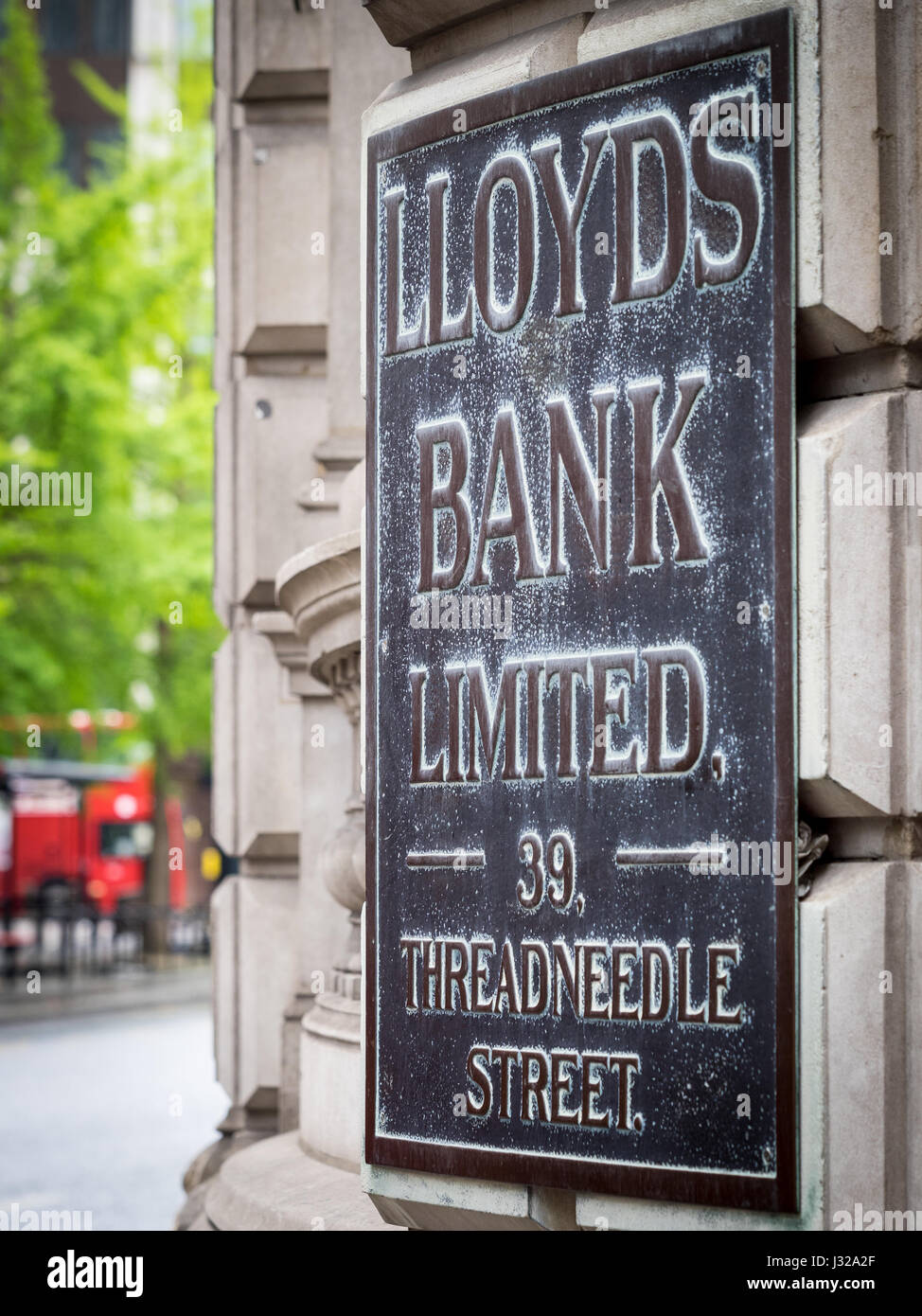 A vintage sign outside a Lloyds Bank branch in the financial district, the City of London, UK. Stock Photo