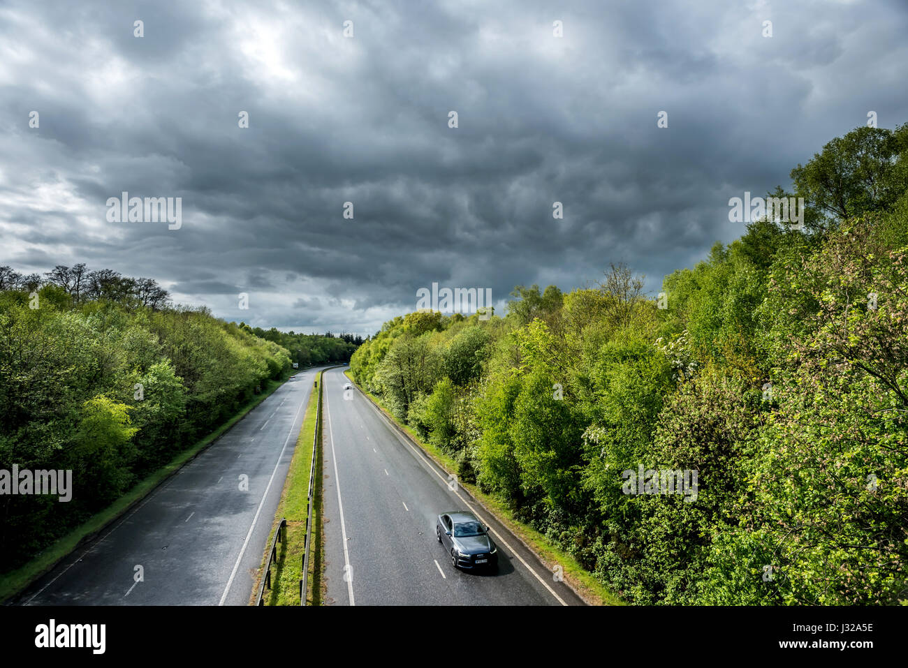 The A264 road between Horsham and Crawley as it cuts through Buchan
