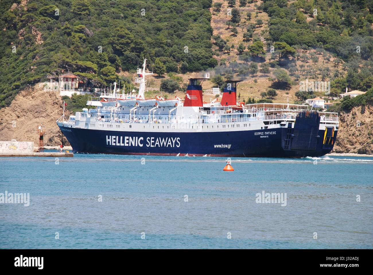 Hellenic Seaways ferry boat Express Pegasus departing from Chora harbour on the Greek island of Skopelos on June 24, 2013. Stock Photo