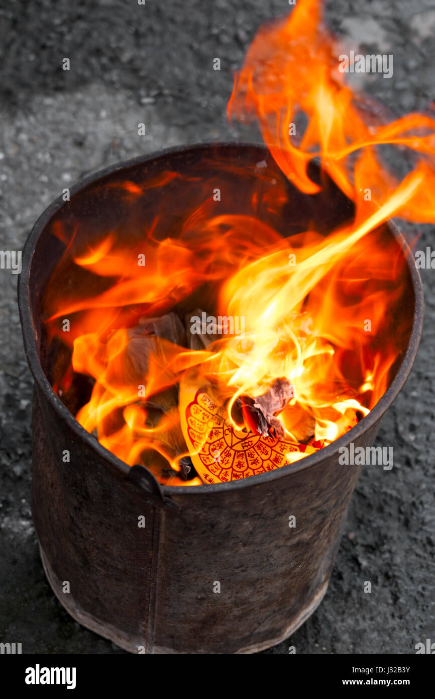 folded joss paper burned during Chinese funerals or as offering Stock Photo  - Alamy