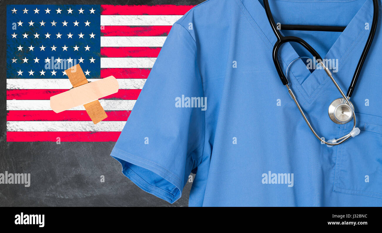 Blue doctor scrubs and stethoscope in front of USA flag. American