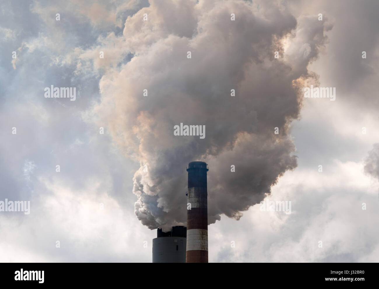 Smoke and air pollution from the chimney of an American industiral coal fired power station, USA Stock Photo