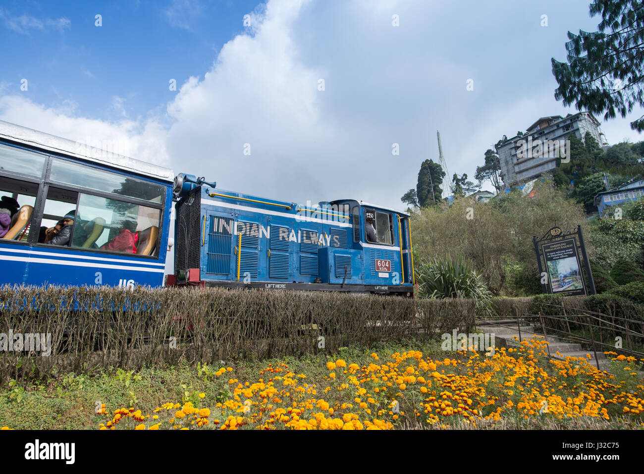 DARJEELING, INDIA – NOVEMBER 27, 2016: steam engine hauled DHR Toy Train has been operating on 2-foot gauge tracks since 1880s and gained the UNESCO W Stock Photo