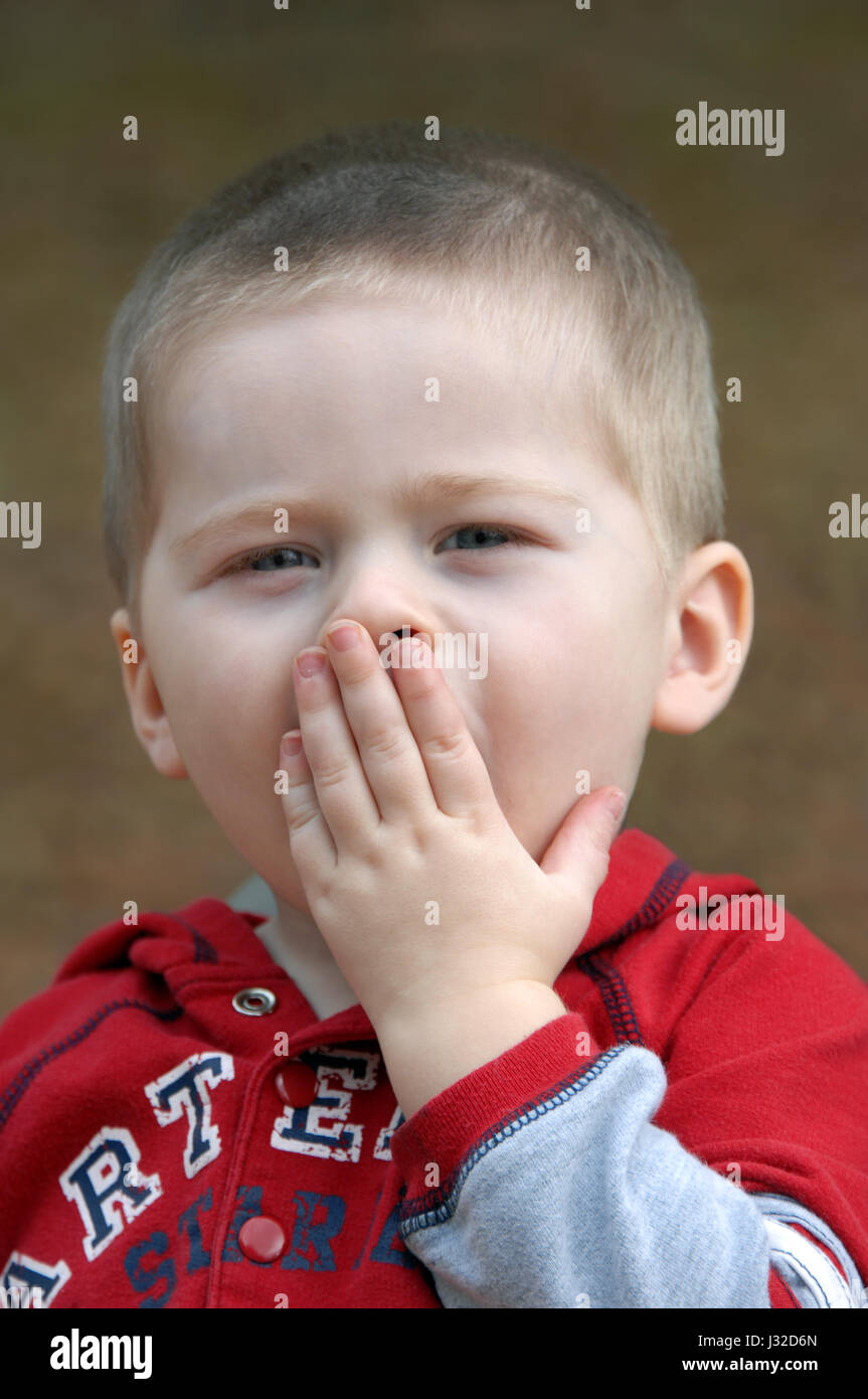 Close up of a boy with his mouth open hires stock photography and