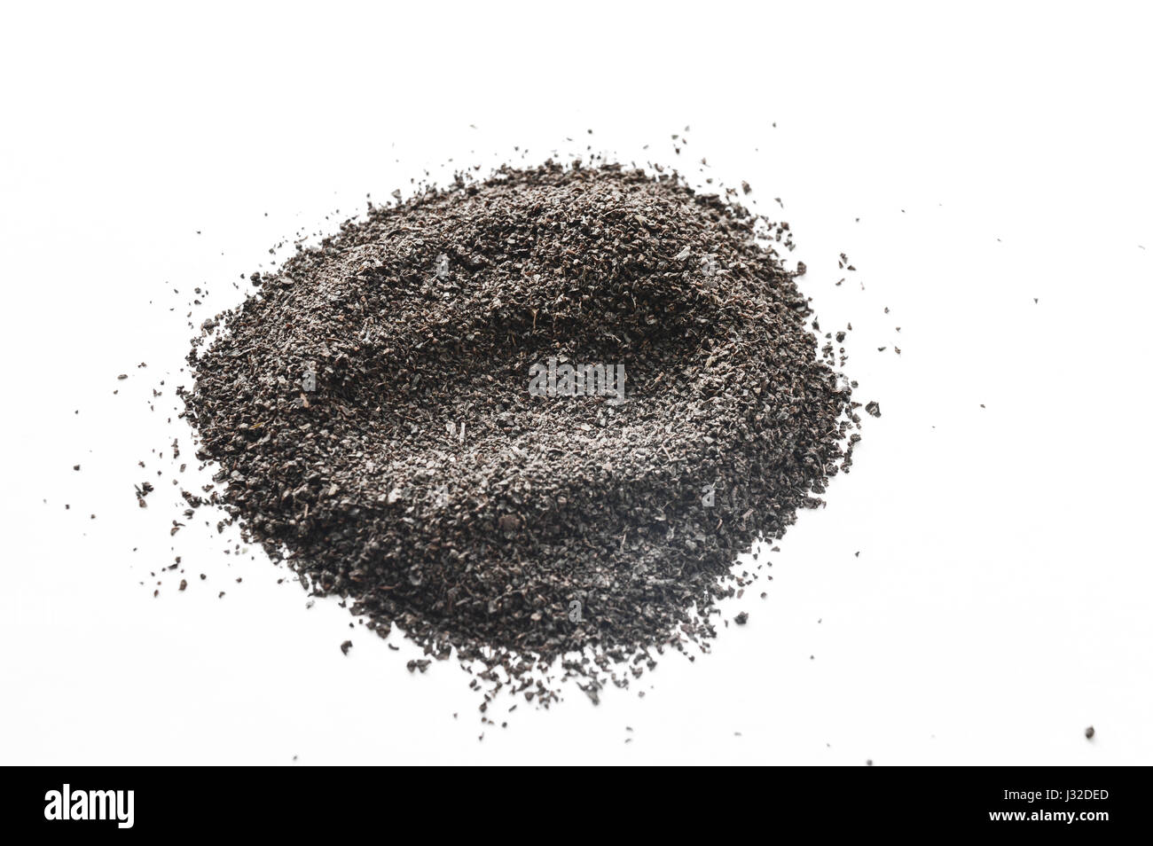black tea powder isolated on white Stock Photo - Alamy