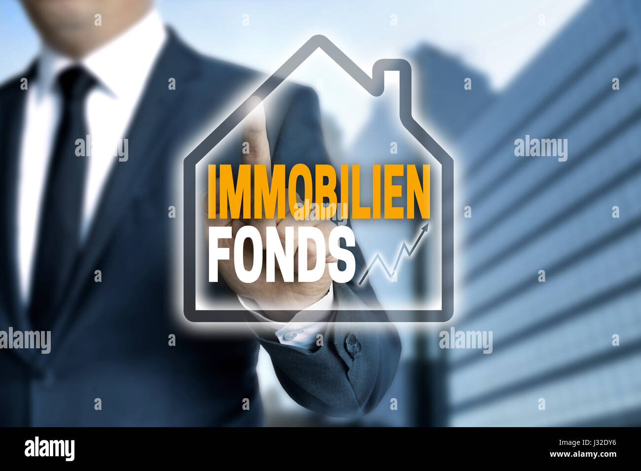 immobilienfonds (in german Real estate fund) touchscreen is operated by businessman. Stock Photo