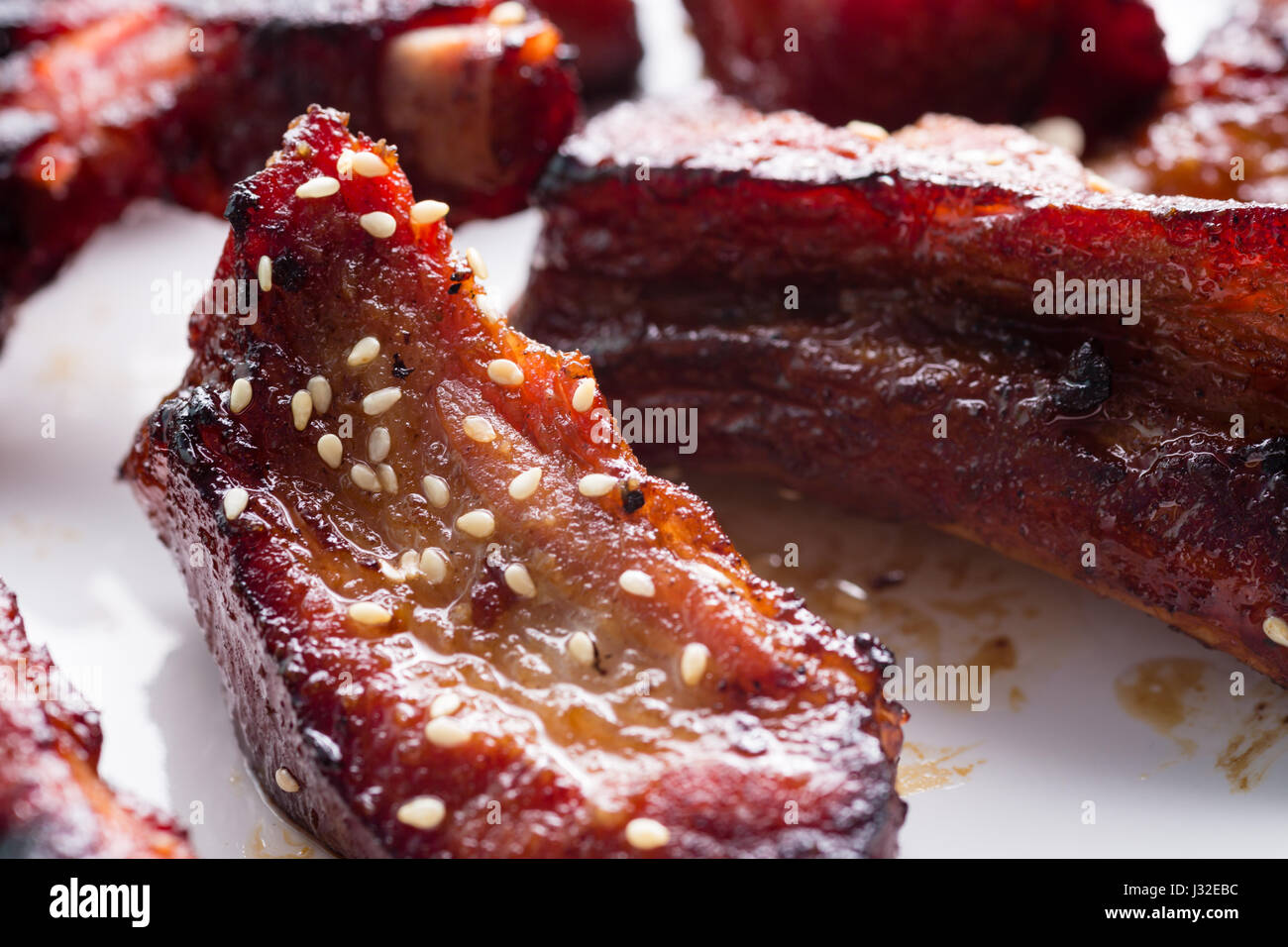 German style pork ribs on white plate Stock Photo Alamy
