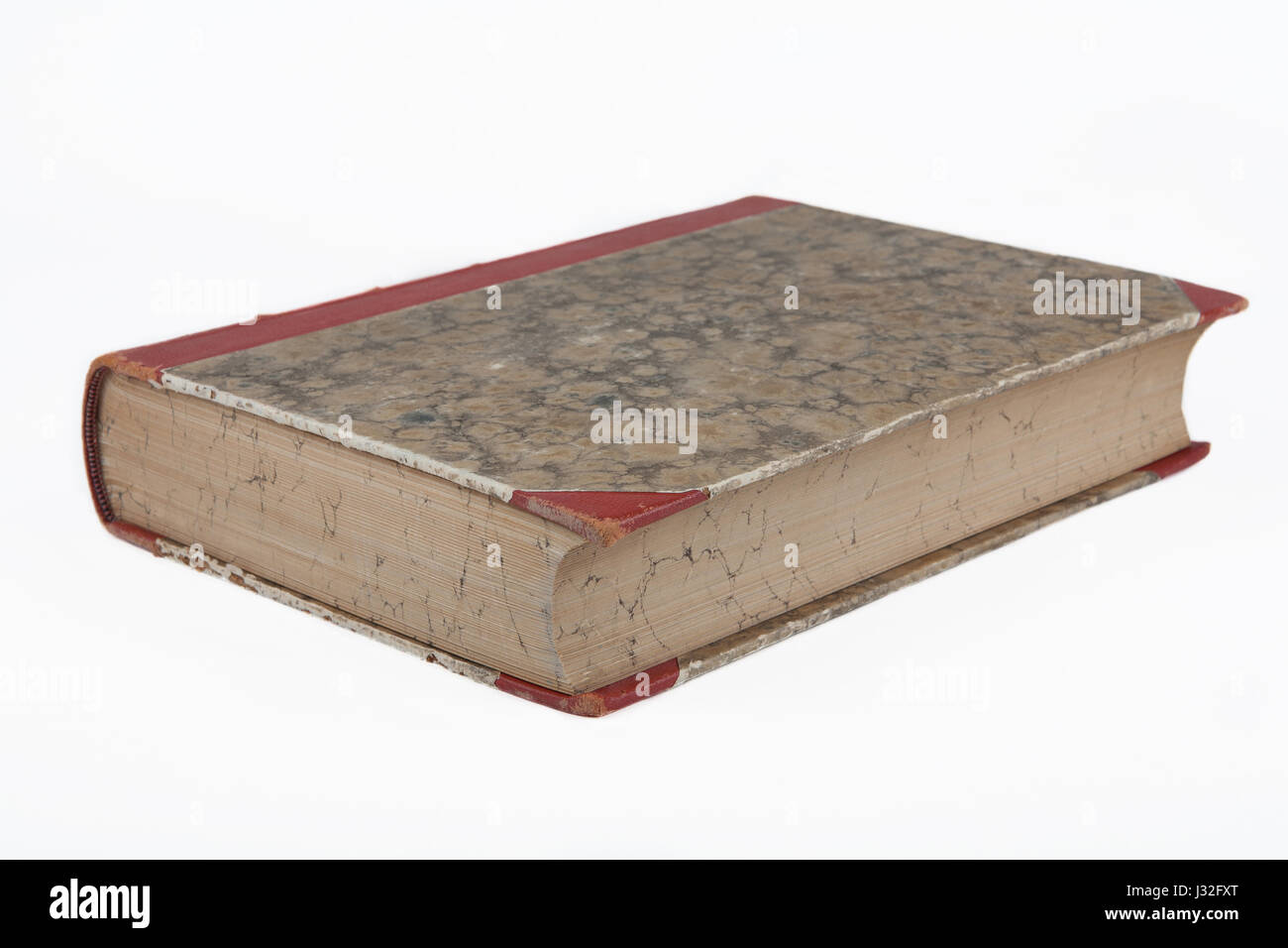 Old antique book with decorative marble texture.Isolated on white background Stock Photo