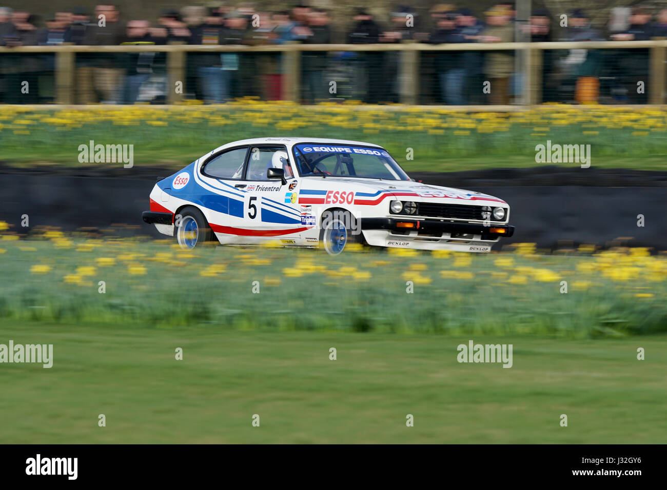 The Ford Capri 3.0 of Mark Fowler & Emanuele Pirro at speed during the 75th Goodwood Members Meeting Stock Photo