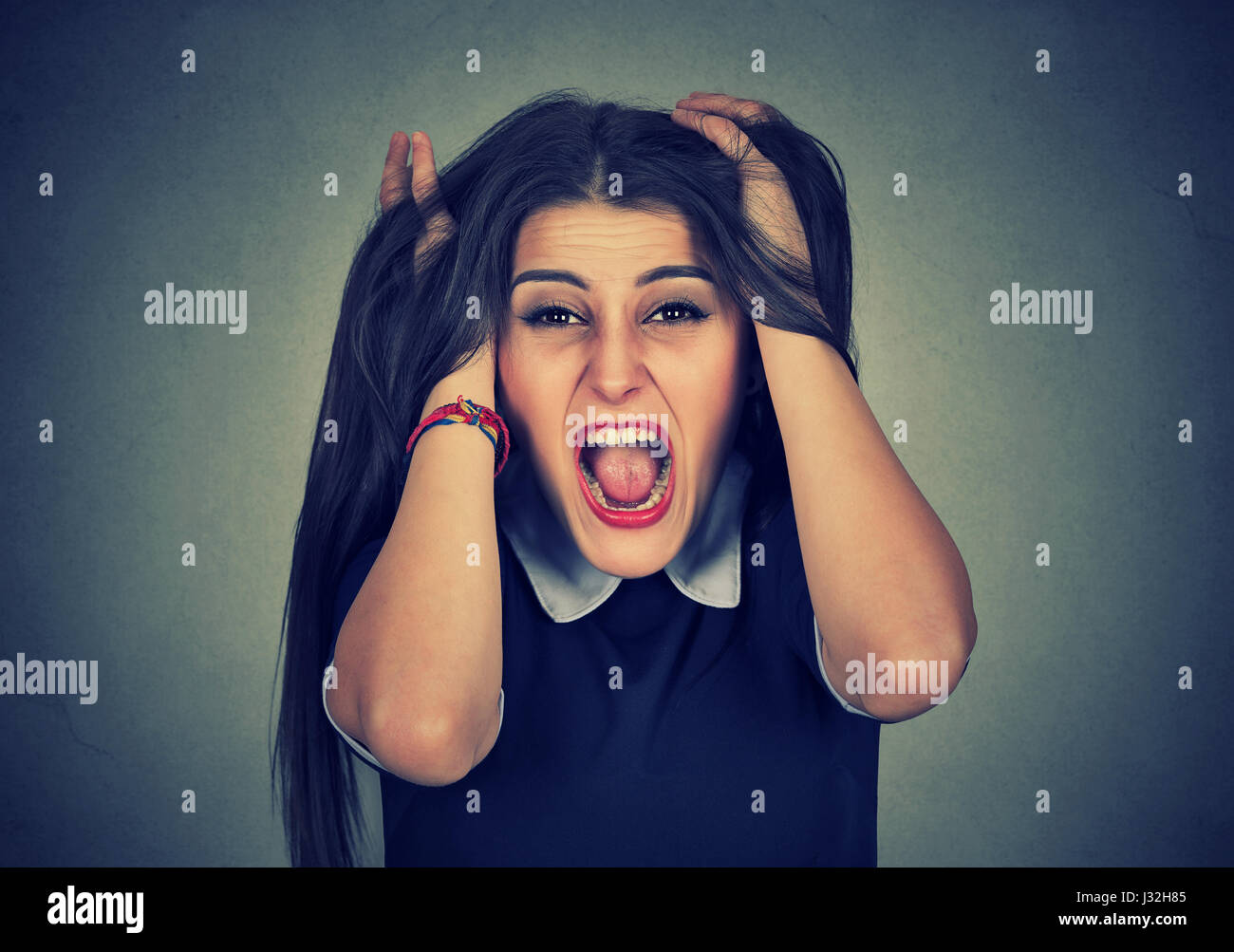 Woman pulling hair out hires stock photography and images Alamy