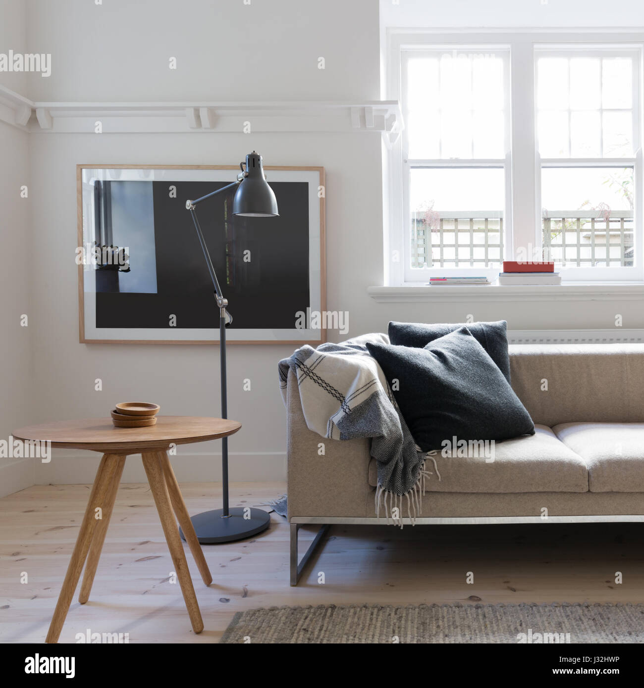 Scandi styled living room interior in art deco Australian apartment Stock Photo