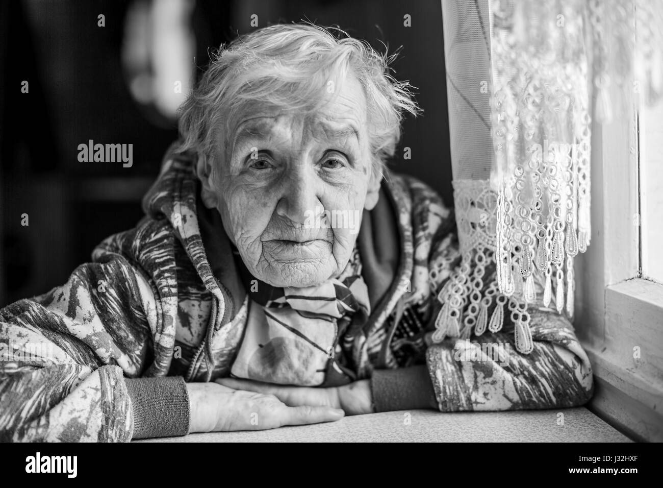Portrait of an elderly woman. Grandma, black-and-white photo. Stock Photo