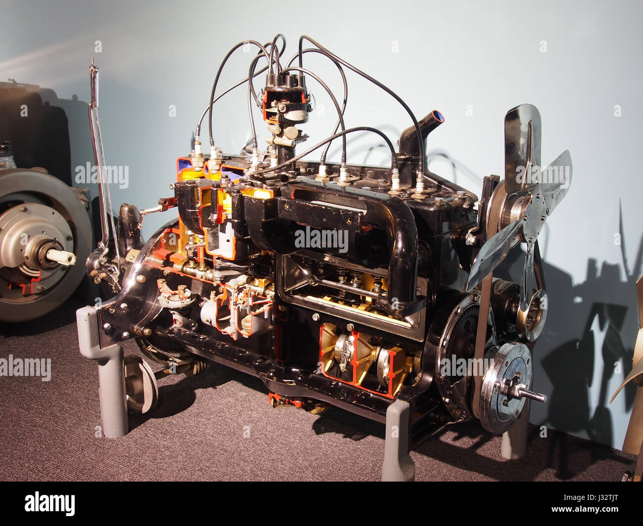 Exploded Engine Museum A detailed photograph of a car engine displayed at the Louwman Museum ...