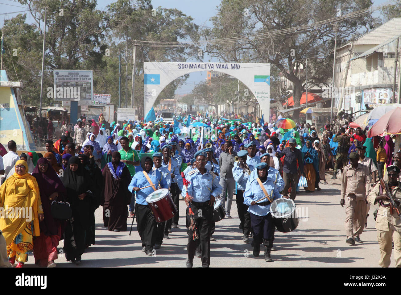 Residents of Kismayo, Somalia march during celebrations to mark International Women's Day on March 8, 2017. AMISOM Photo / Awil Abukar Stock Photo