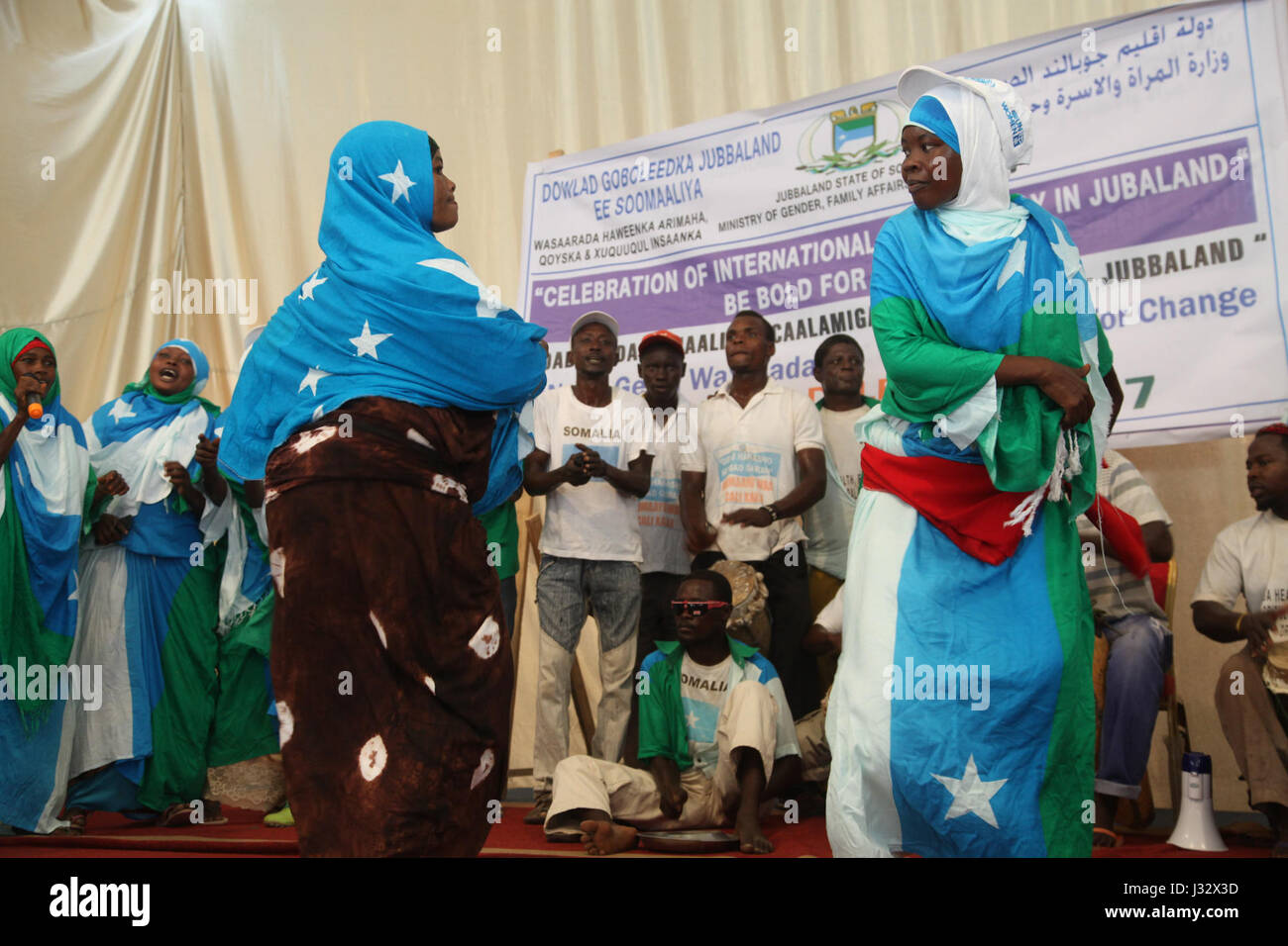 Residents of Kismayo, Somalia attend celebrations to mark International Women's Day on March 8, 2017. AMISOM Photo / Awil Abukar Stock Photo