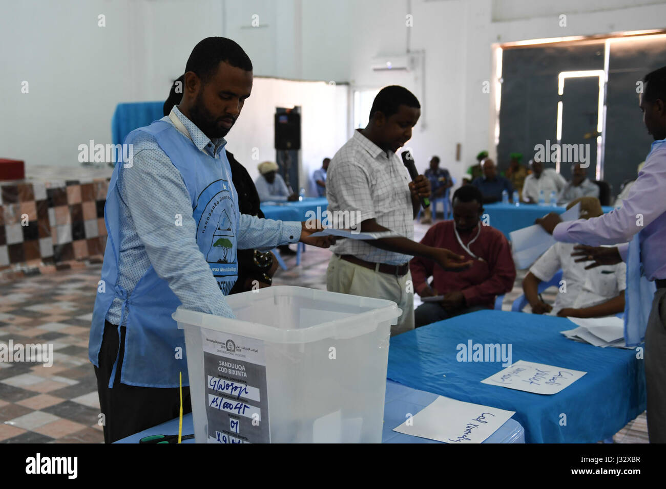 Electoral officials count votes during the ongoing electoral process to choose Somaliland's representatives to the Upper House of the Federal Parliament in Mogadishu, Somalia, on January 8, 2017. AMISOM Photo / Omar Abdisalan Stock Photo