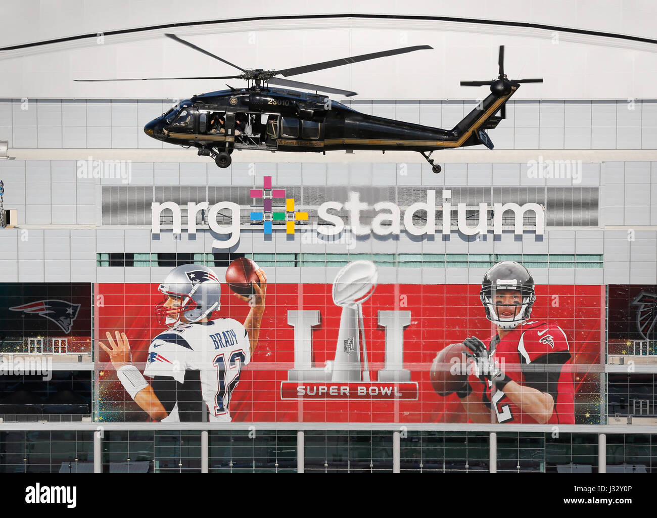 A U.S. Customs and Border Protection, Air and Marine Operations, Black Hawk helicopter flies over NRG Stadium in advance of Super Bowl LI in Houston, Texas, Jan 31, 2017. U.S. Customs and Border Protection Photo by Glenn Fawcett Stock Photo