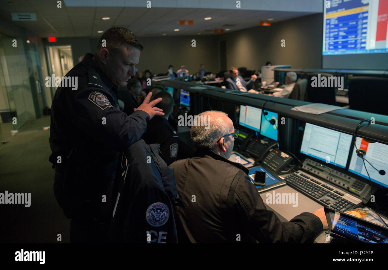 Officers and agents with the U.S. Customs and Border Protection Office of Field Operations and Air and Marine Operations work alongside a contingent of local, state and federal law enforcement agencies at the Houston Police Department's emergency operations center to ensure security of Super Bowl LI Feb 3, 2017.  U.S. Customs and Border Protection Photo by Glenn Fawcett Stock Photo