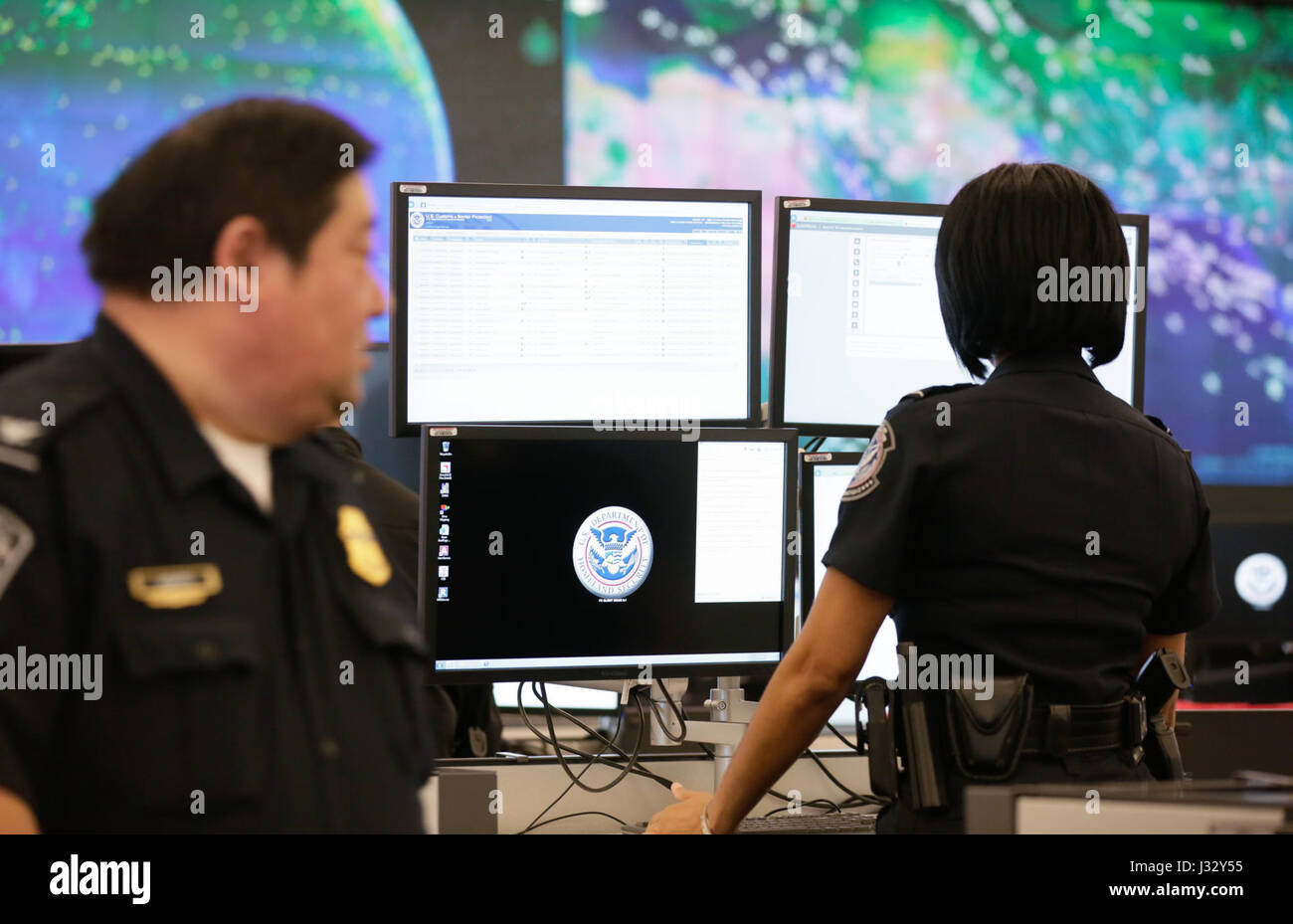 Officers of the U.S. Customs and Border Protection Office of Field Operations conduct global