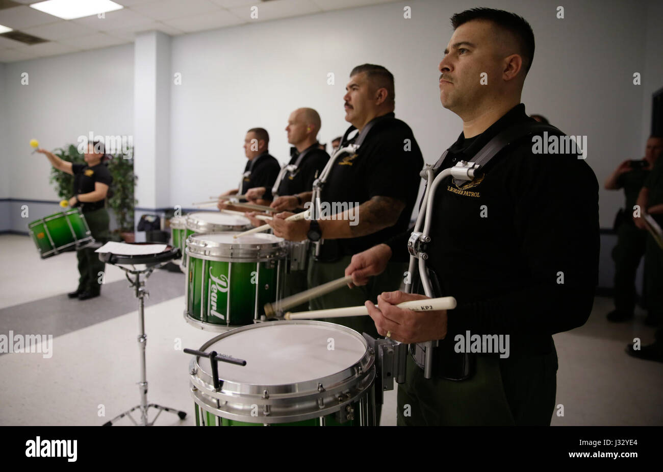 Members of the U.S. Border Patrol Pipes and Drums Band rehearse at the Woodbridge Elks Lodge in Dale City, Va., January 18, 2017, in preparation for the inauguration of the 45th President, Donald J. Trump. U.S. Customs and Border Protection Photo by Glenn Fawcett Stock Photo