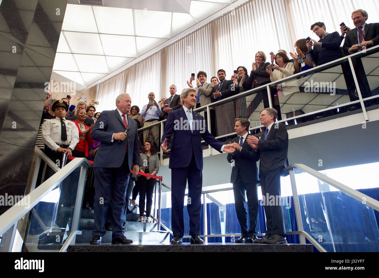 U.S. Secretary of State John Kerry acknowledges the crowd, as they gather in the main lobby of the Department's Harry S. Truman building, before delivering farewell remarks on his final day in office on January 19, 2017. Stock Photo