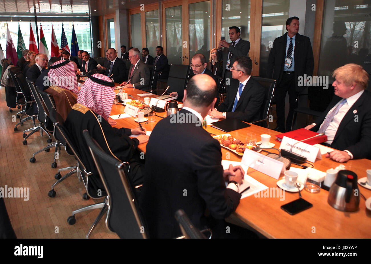 Rex Tillerson, U.S. Secretary of State, engages in discussions on Syria during the G-20 Foreign Ministers' Meeting in Bonn, Germany. The meeting focused on international diplomatic efforts to address the Syrian conflict. Stock Photo