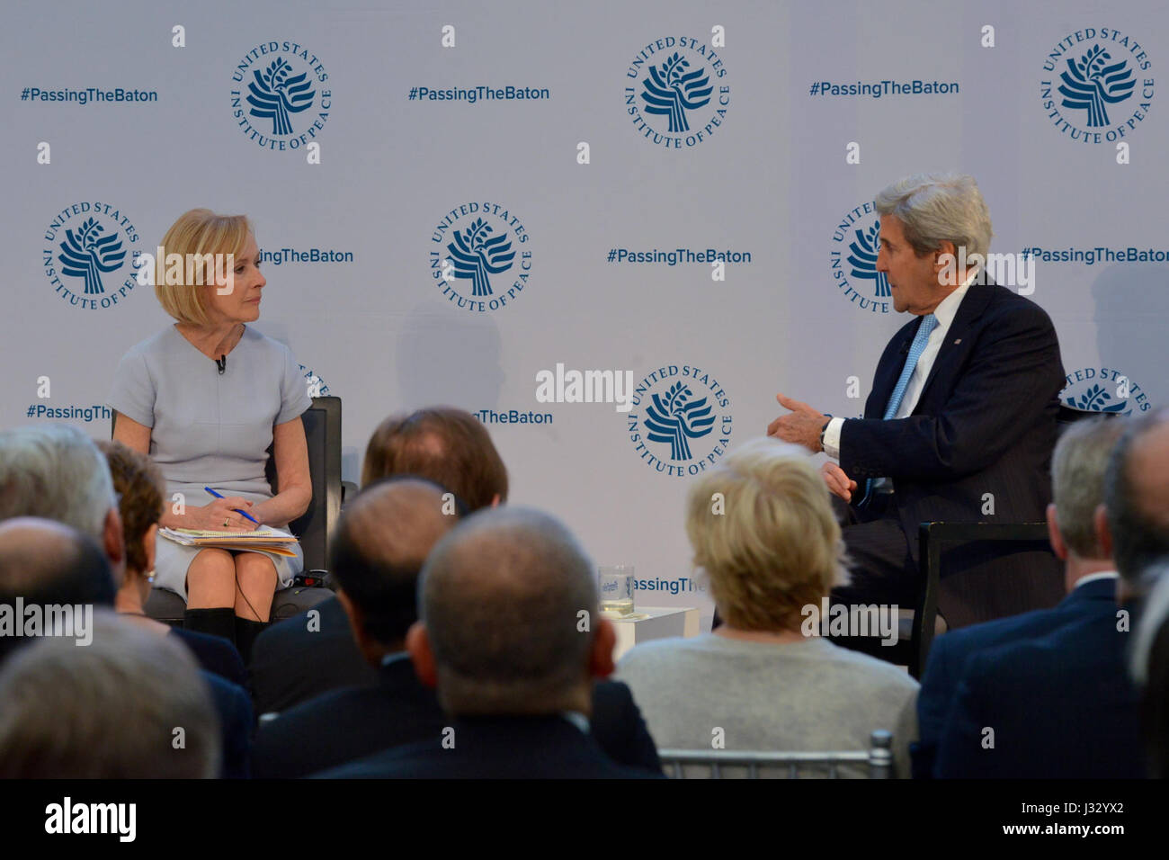 U.S. Secretary of State John Kerry speaks with Judy Woodruff of PBS' NewsHour about our nation’s top foreign policy priorities leading into the next administration during the U.S. Institute of Peace’s “Passing the Baton 2017: America's Role in the World” event at the Institute in Washington, D.C., on January 10, 2017. Stock Photo