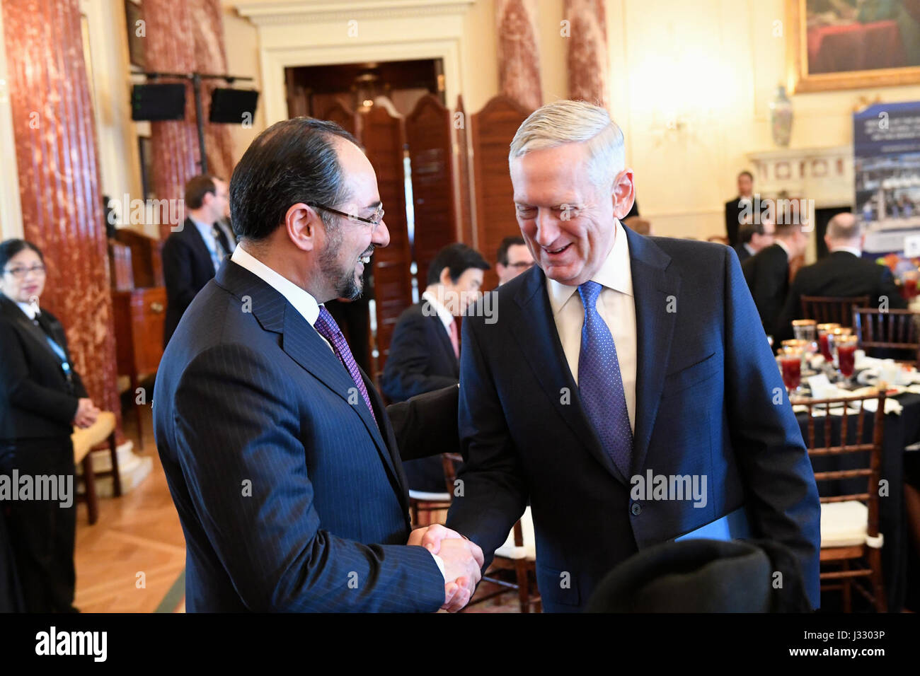 Secretary of Defense James Mattis chats with Afghan Foreign Minister Salahuddin Rabbani at the Ministerial Working Luncheon of the Global Coalition Working to Defeat ISIS at the U.S. Department of State in Washington, D.C. on March 22, 2017. Stock Photo