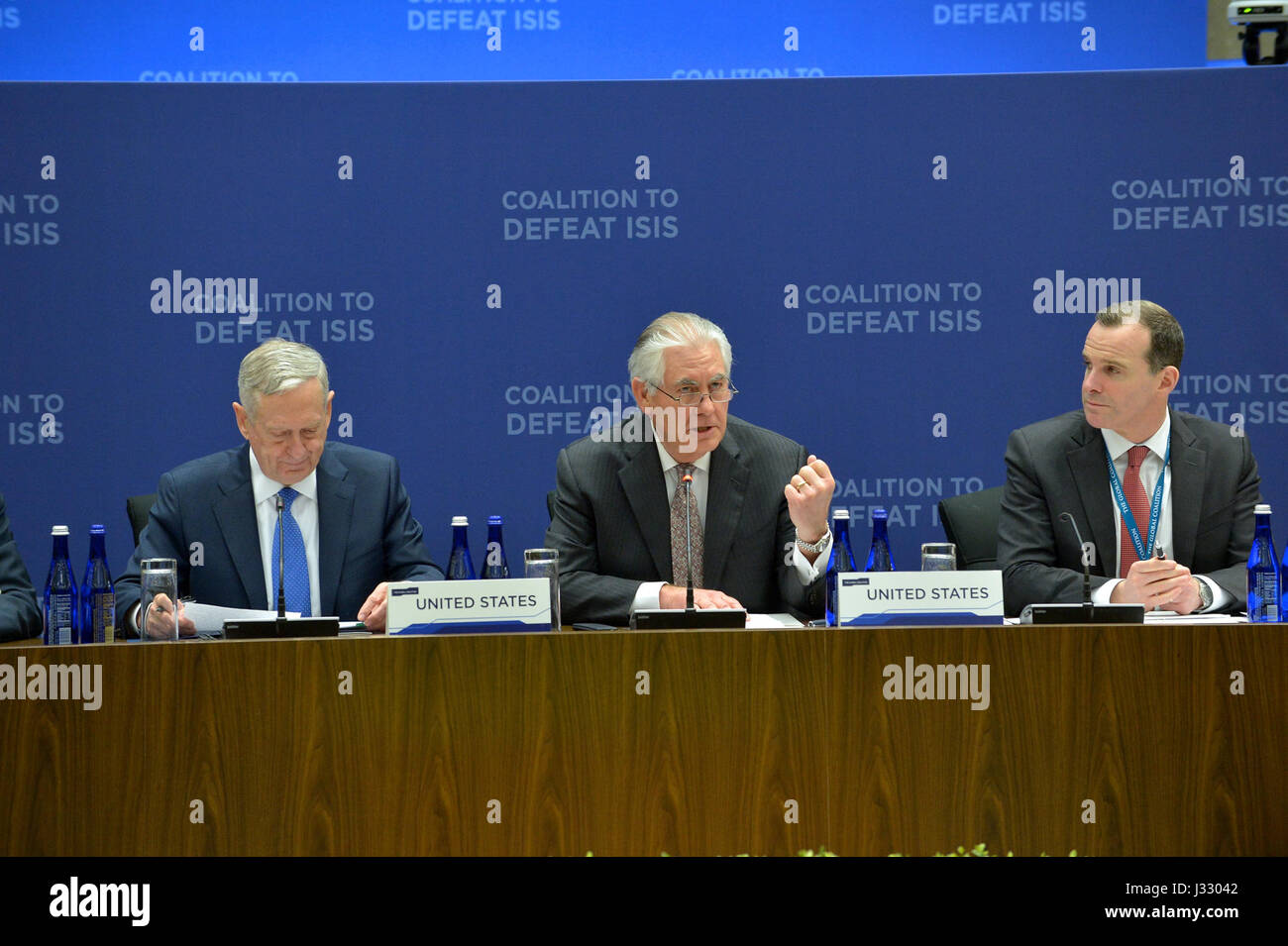 U.S. Secretary of State Rex Tillerson, flanked by Secretary of Defense James Mattis and Special Presidential Envoy for the Global Coalition to Counter ISIS Brett McGurk attends the afternoon Ministerial Plenary of the Global Coalition Working to Defeat ISIS at the U.S. Department of State in Washington, D.C. on March 22, 2017. Stock Photo