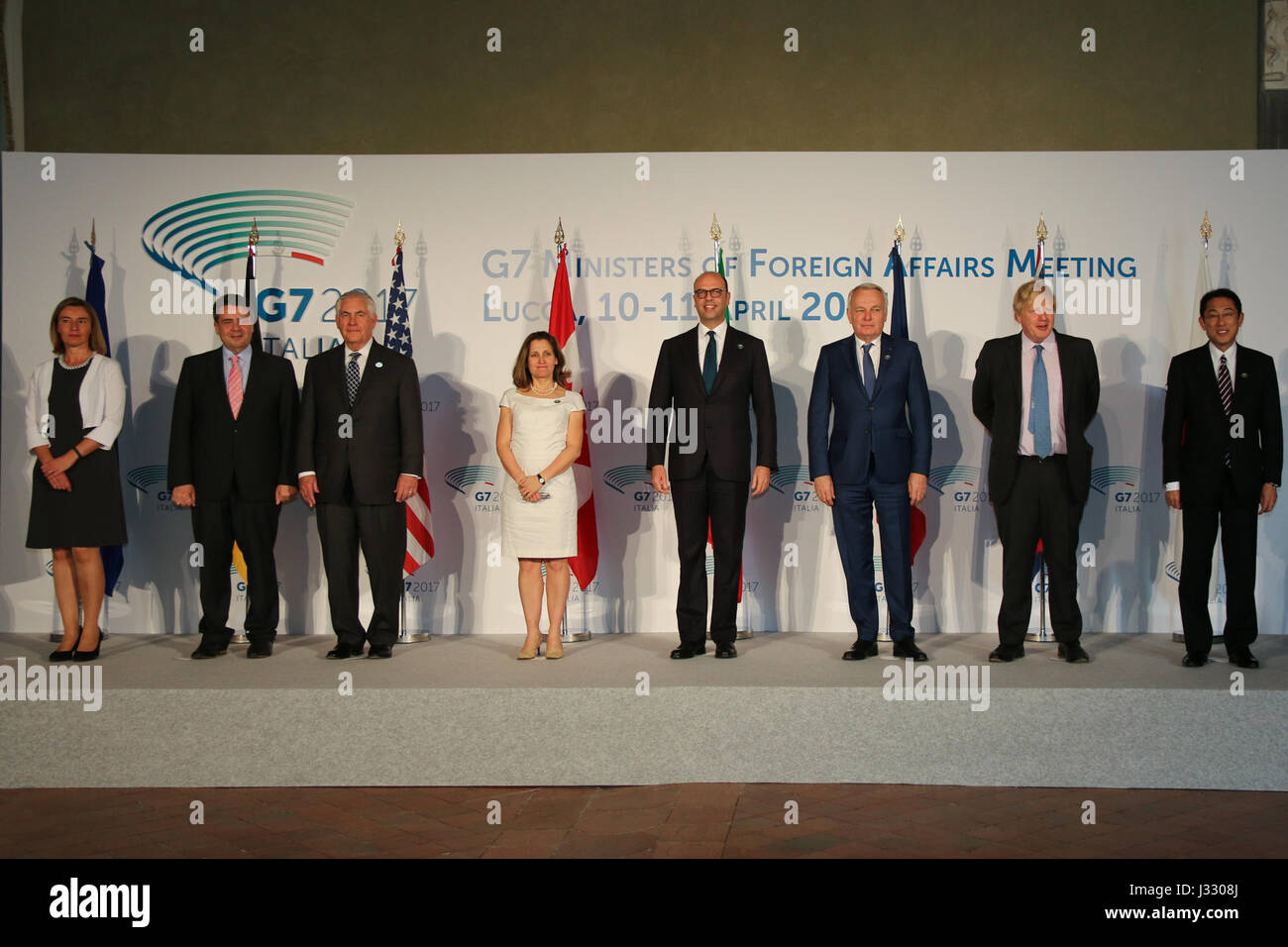U.S. Secretary of State Rex Tillerson poses for a family photo with his