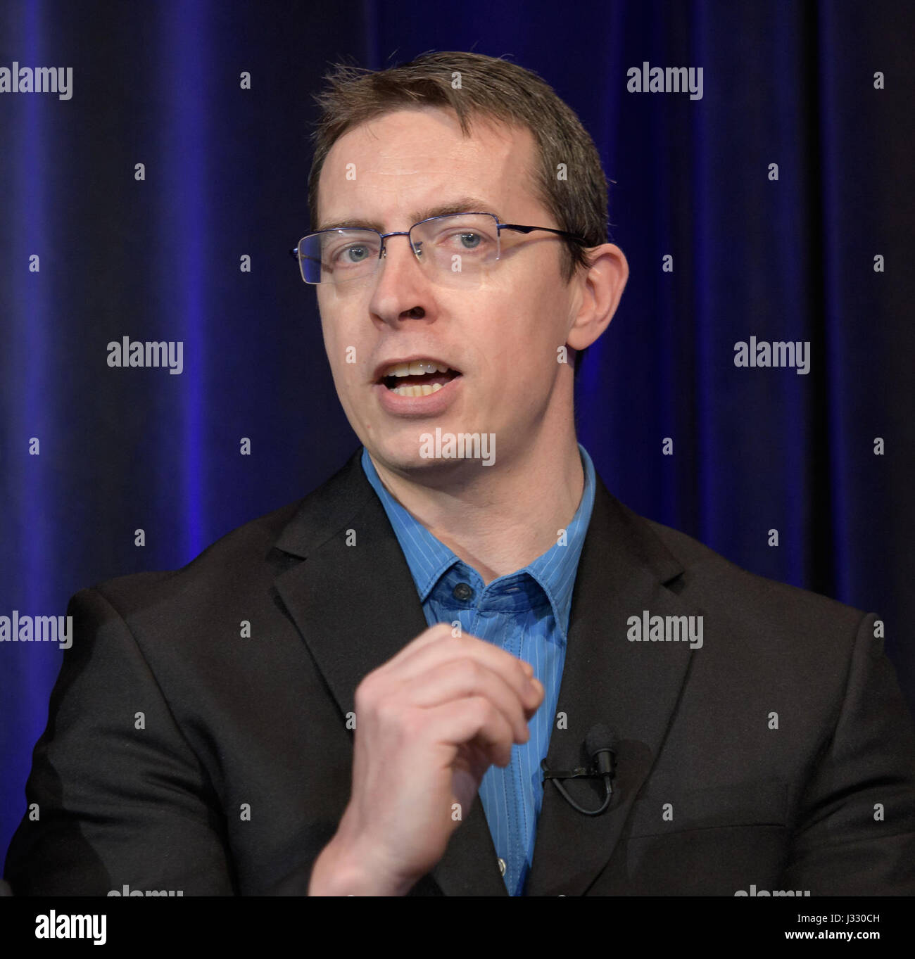 University of Liege in Belgium Astronomer Michael Gillon presents research findings during a TRAPPIST-1 planets briefing, Wednesday, Feb. 22, 2017 at NASA Headquarters in Washington. Researchers revealed the first known system of seven Earth-size planets around a single star called TRAPPIST-1. Photo Credit: (NASA/Bill Ingalls) More: exoplanets.nasa.gov/trappist1/ ( https://exoplanets.nasa.gov/trappist1/ ) Stock Photo