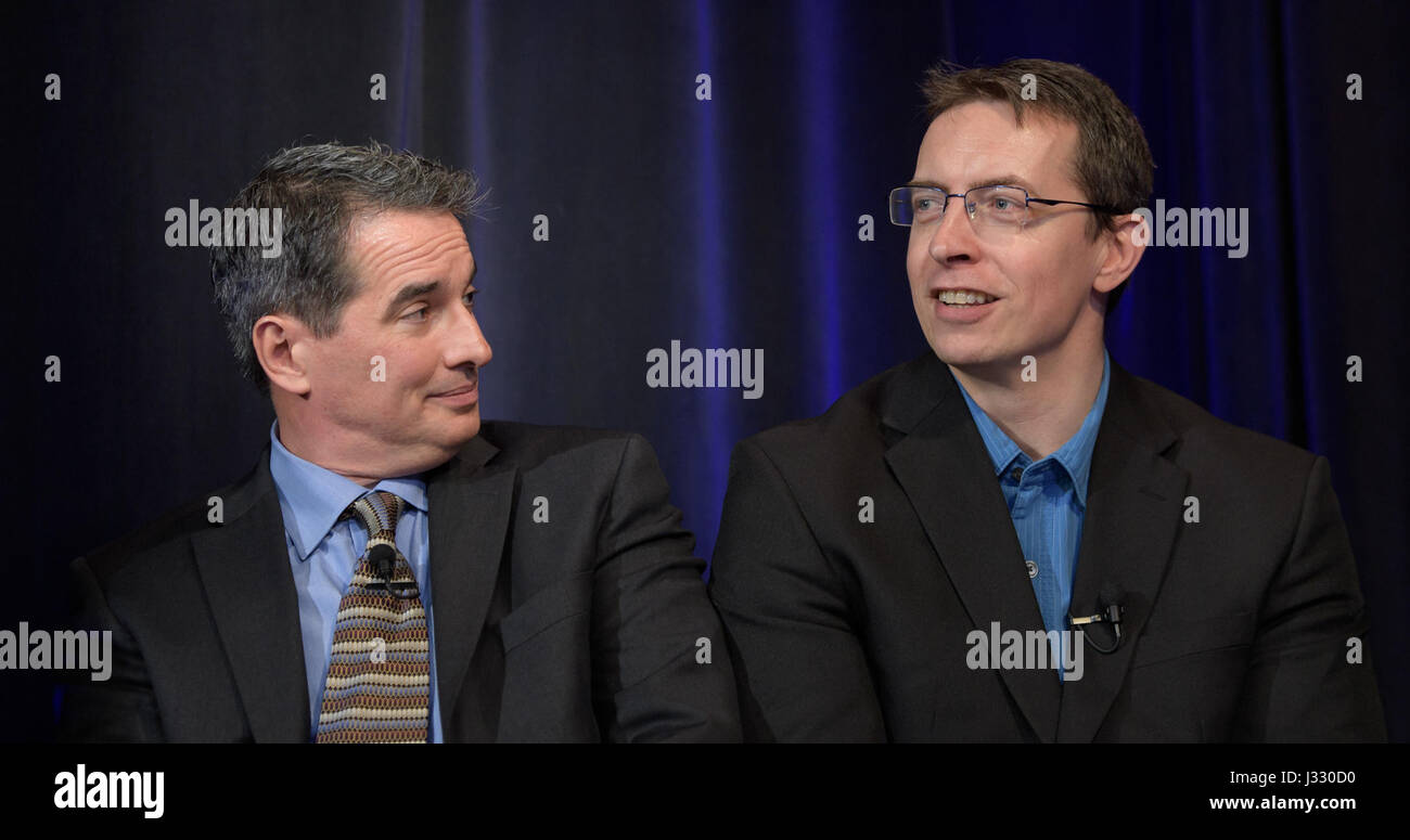 Manager of NASA's Spitzer Science Center at Caltech/IPAC, Pasadena, California Sean Carey, left, and University of Liege in Belgium Astronomer Michael Gillon, present research findings during a TRAPPIST-1 planets briefing, Wednesday, Feb. 22, 2017 at NASA Headquarters in Washington. Researchers revealed the first known system of seven Earth-size planets around a single star called TRAPPIST-1. Photo Credit: (NASA/Bill Ingalls) More: exoplanets.nasa.gov/trappist1/ ( https://exoplanets.nasa.gov/trappist1/ ) Stock Photo