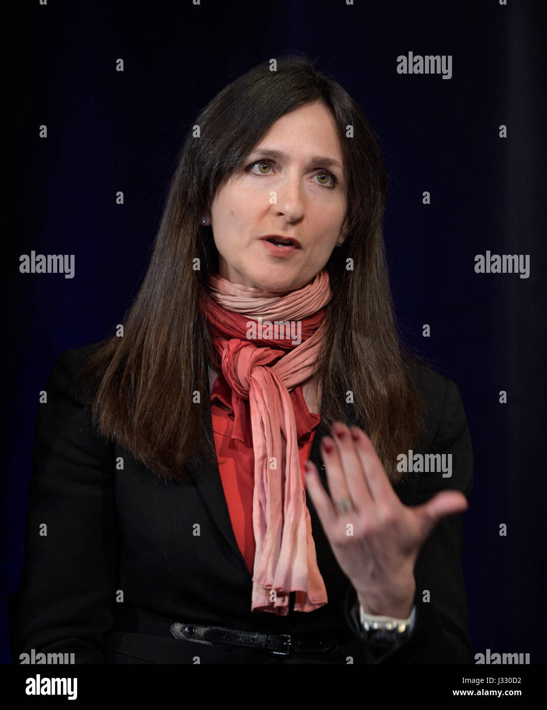 Professor of planetary science and physics at Massachusetts Institute of Technology, Cambridge, Sara Seager presents research findings during a TRAPPIST-1 planets briefing, Wednesday, Feb. 22, 2017 at NASA Headquarters in Washington. Researchers revealed the first known system of seven Earth-size planets around a single star called TRAPPIST-1. Photo Credit: (NASA/Bill Ingalls) More: exoplanets.nasa.gov/trappist1/ ( https://exoplanets.nasa.gov/trappist1/ ) Stock Photo