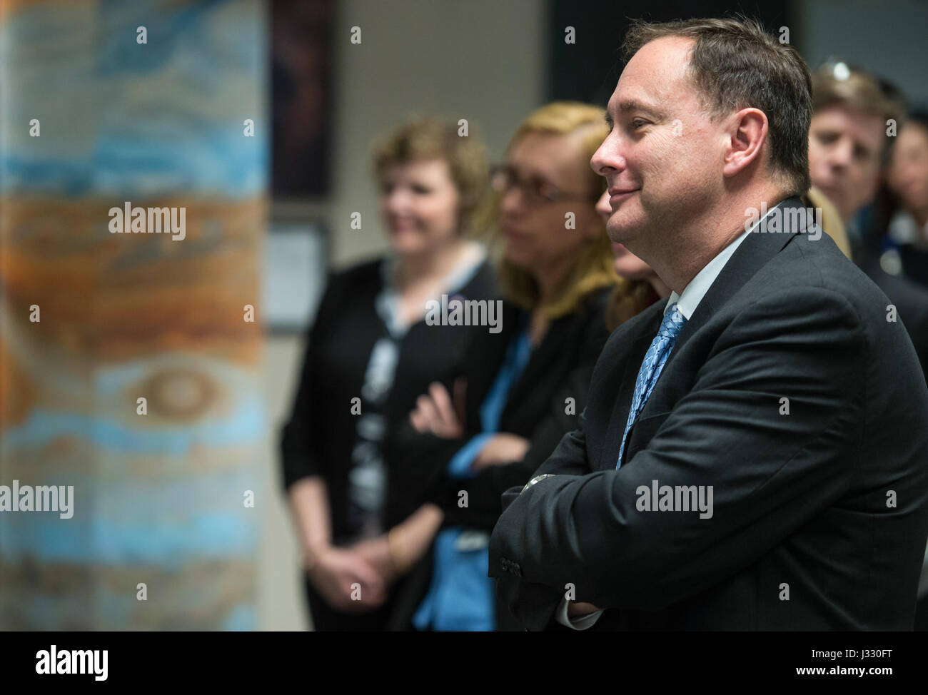 Acting NASA Administrator Robert Lightfoot during a visit to Lockheed Martin's Mission Support Area, Wednesday, April 5, 2017 at Lockheed Martin Space Systems in Littleton, Colo. The Mission Support Area supports six of NASA's robotic planetary spacecraft: Mars Odyssey, Mars Reconnaissance Orbiter, MAVEN, Juno, OSIRIS-REx, and the Spitzer Space Telescope.  Working with the NASA centers and mission science teams, the engineers develop and send commands and monitor the health of each spacecraft. Stock Photo