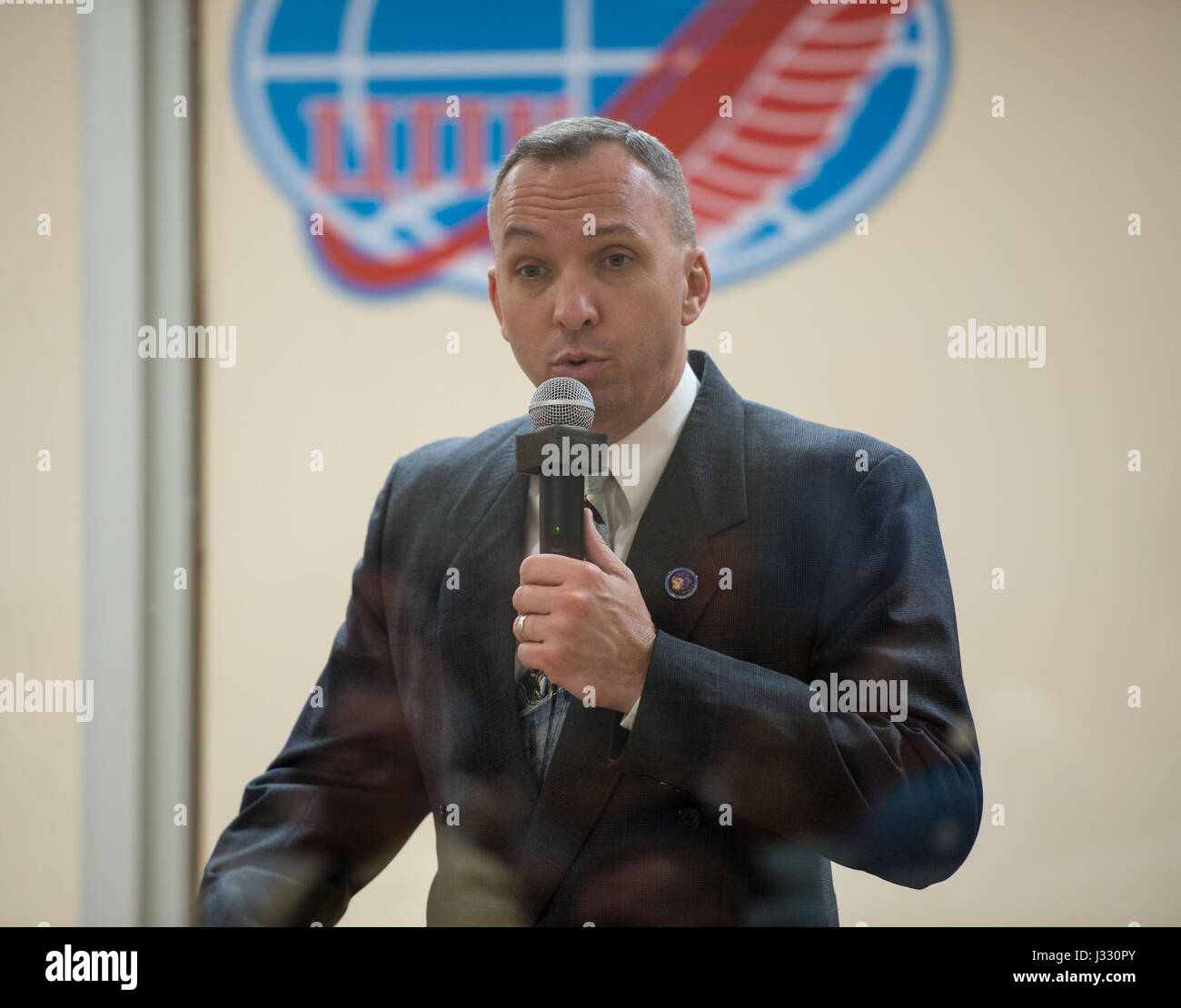 NASA Expedition 51 backup crew member Randy Bresnik speaks during the State Commission meeting to approve the Soyuz launch of Expedition 51 to the International Space Station, Wednesday, April 19, 2017 at the Cosmonaut Hotel in Baikonur, Kazakhstan.  The mission is set to launch April 20 from the Baikonur Cosmodrome.  Photo Credit: (NASA/Aubrey Gemignani) Stock Photo