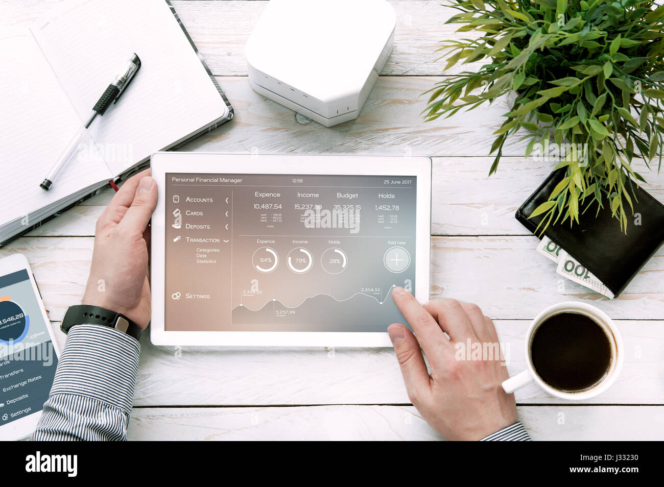 Man holds tablet pc with personal finance manager application made in graphic program Stock Photo