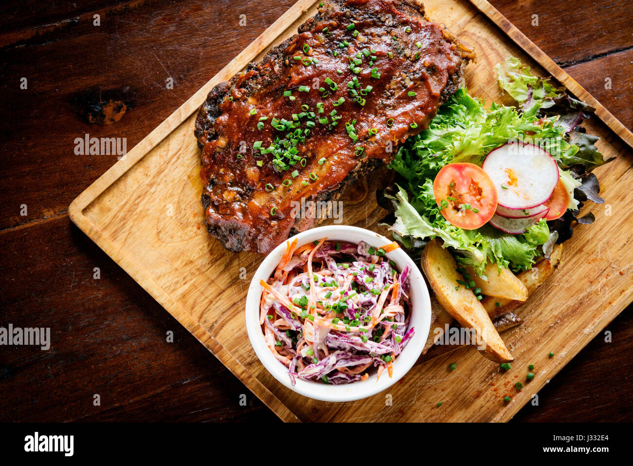 pork bbq ribs with  coleslaw and salad set meal Stock Photo