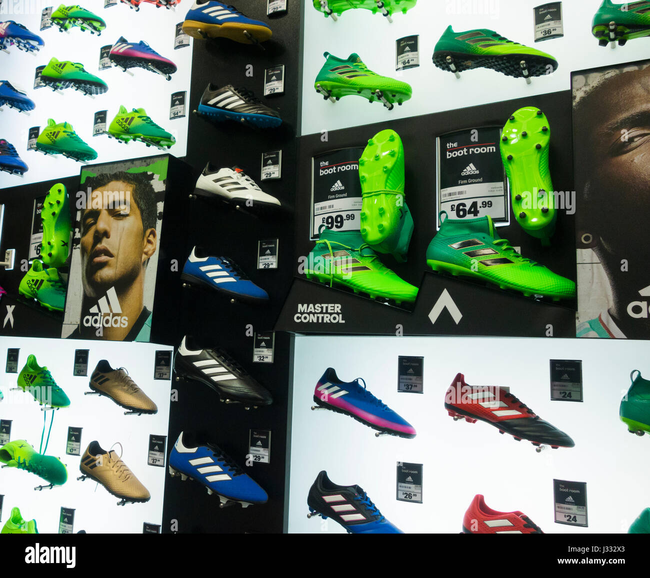 Adidas football boots dispay in Sports Direct store. UK Stock Photo - Alamy