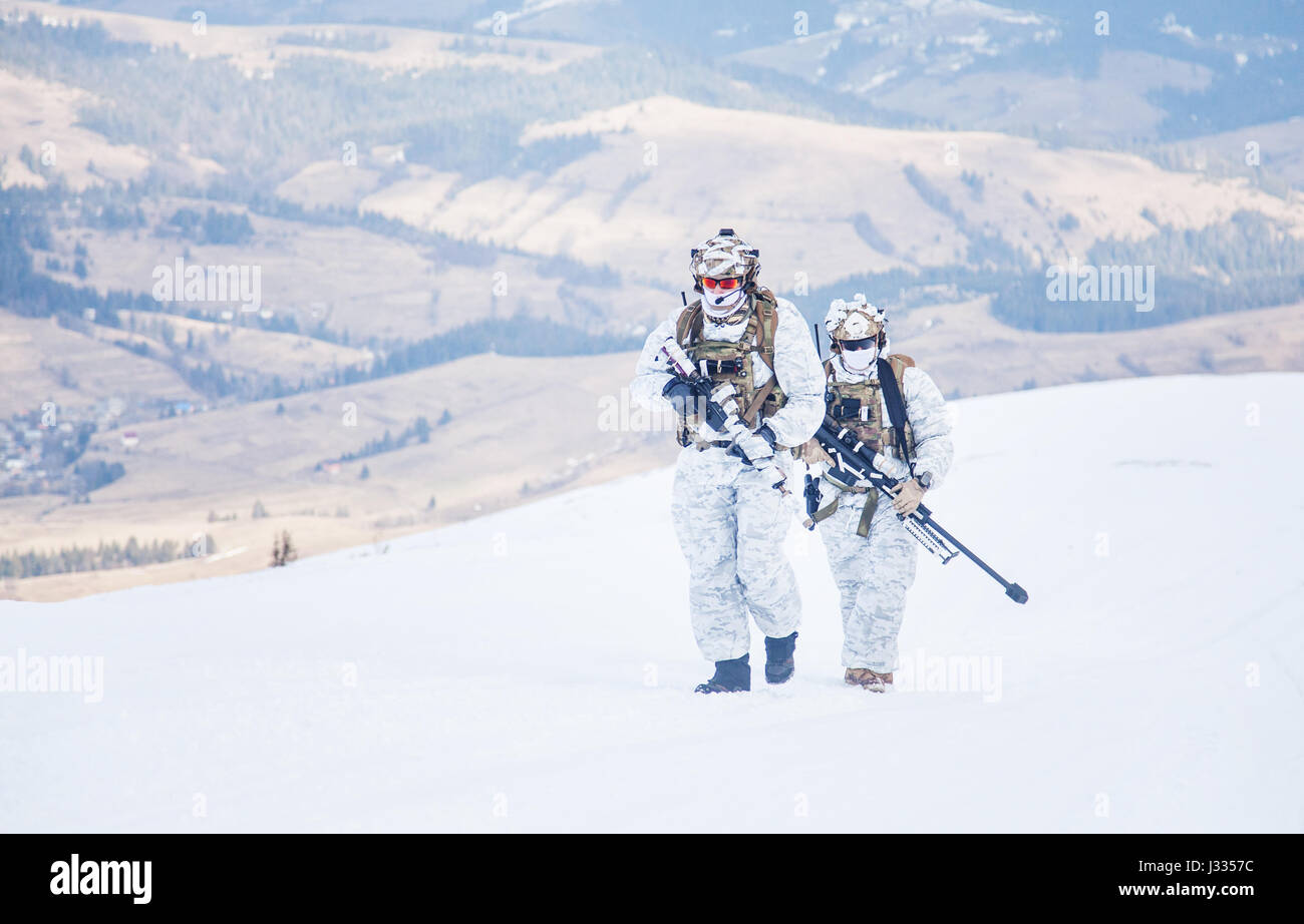 Winter arctic mountains warfare Stock Photo