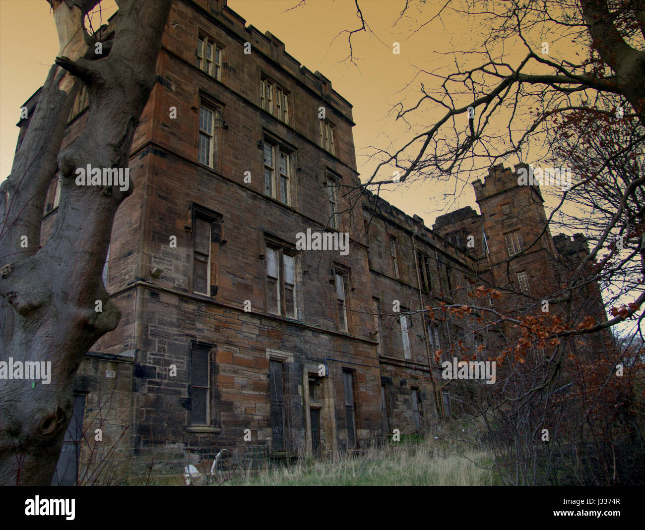 old Gartnavel General Hospital wing bow looking like a Gothic haunted house Stock Photo