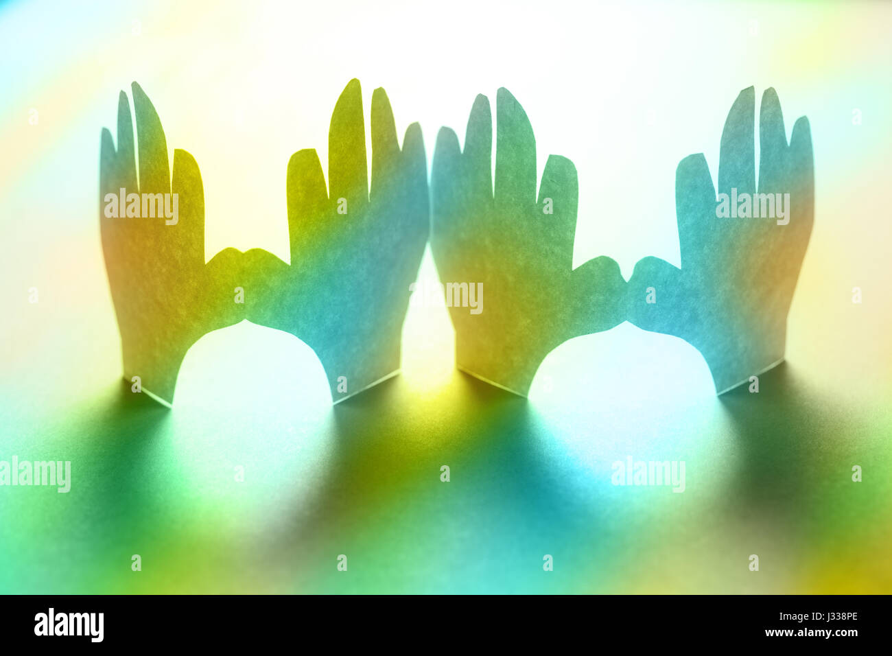 Paper hands in connection as friendship symbol Stock Photo Alamy