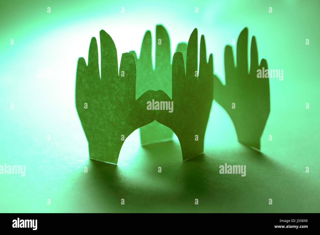 Paper hands in connection as friendship symbol Stock Photo Alamy