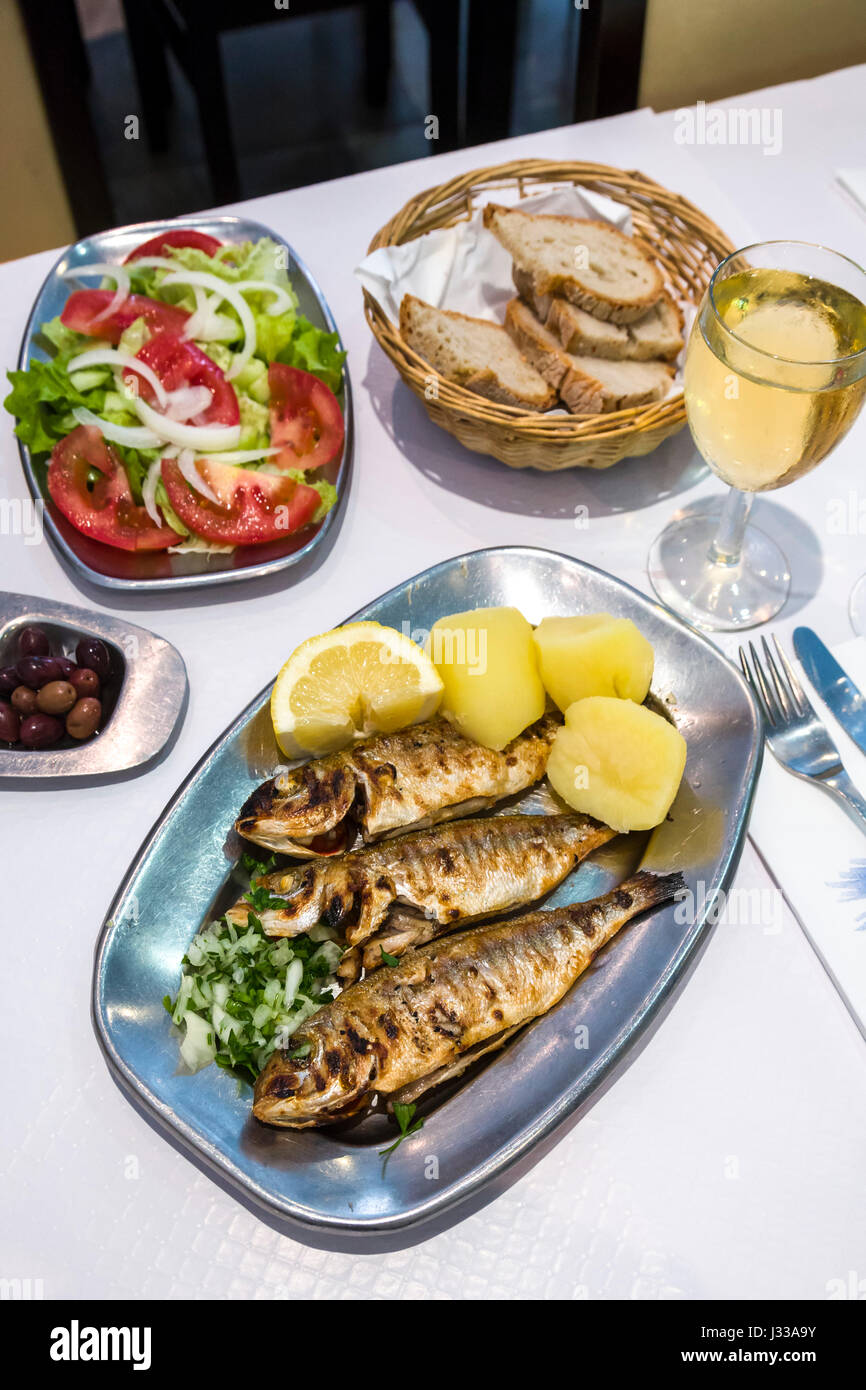 Grilled sardines in a restaurant, Algarve, Portugal Stock Photo Alamy