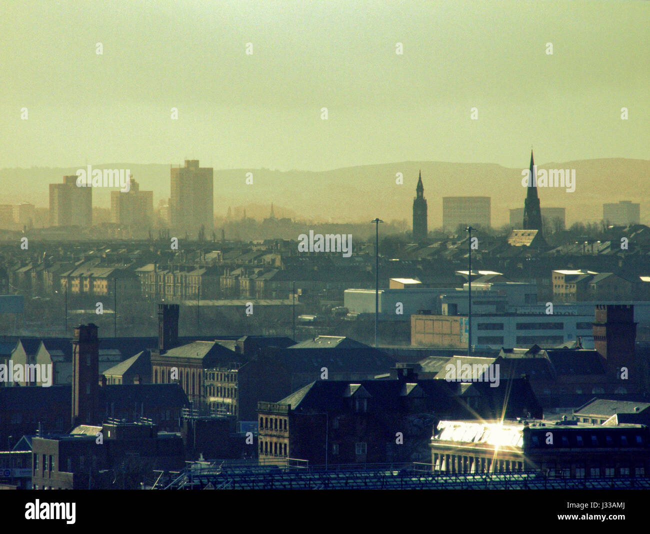 Glasgow City Pollution skyline  with Hope Street  building tops in the foreground one of the uks most polluted streets Glasgow and the spire and roofs Stock Photo