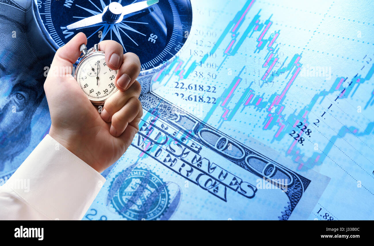 Candlestick Chart Graphic Compass Dollars And Stopwatch In Male Hand Stock Photo Alamy