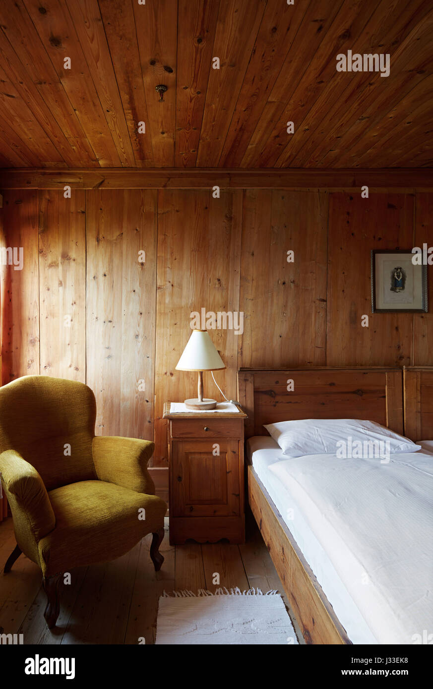 Double room with Swiss stone-pine walls in Hotel Gasthof Bad Dreikirchen, mountain hotel owned by the Wodenegg family, Eisack Valley, Trechiese 12, Barbian, South Tyrol, Italy Stock Photo